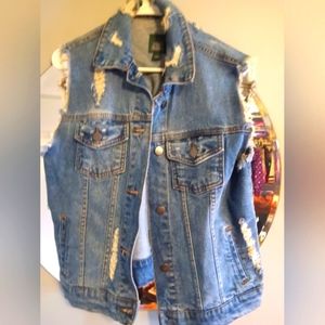 Cute never worn women's distressed jeans vest